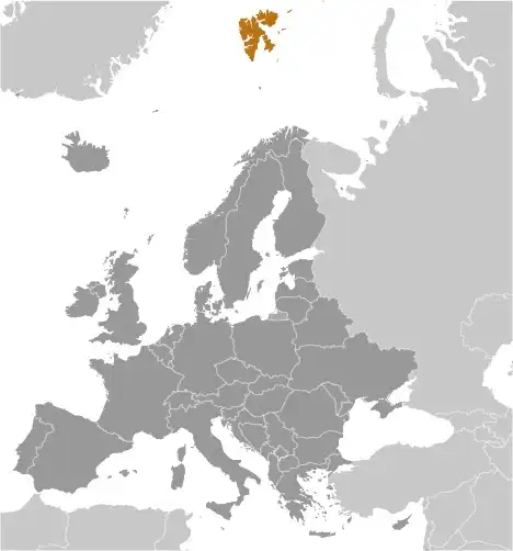 Locator Map of Svalbard (sometimes referred to as Spitsbergen, the largest island in the archipelago) showing the country on the continent in color